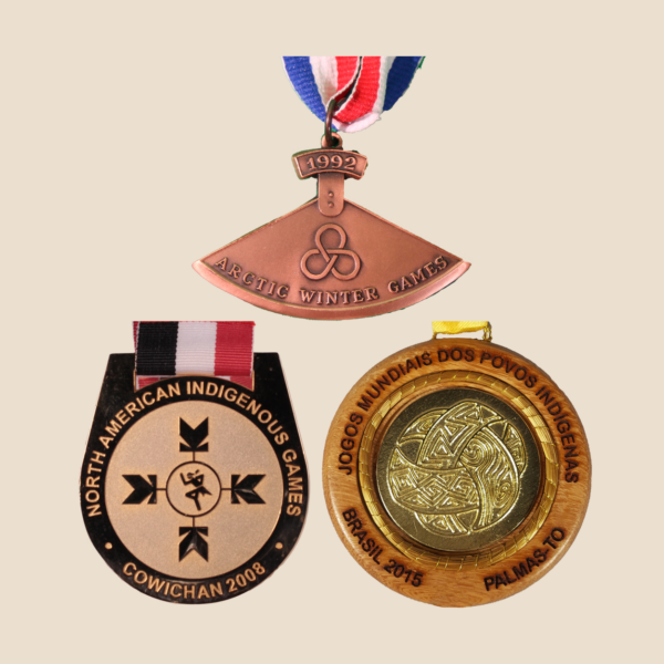 Three different Indigenous Games medals